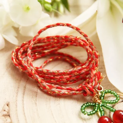 bola grossesse gravé thème cerise avec perles et collier en cordon tressé